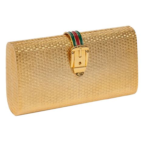 gold clutch gucci|gucci clutch used.